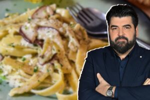 Antonino Cannavacciuolo e nello sfondo pasta ai porcini